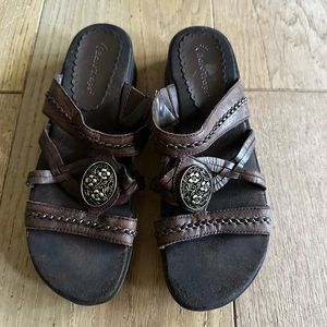 Baretraps dark brown braided leather slip-on sandals with flower pendant- size 9